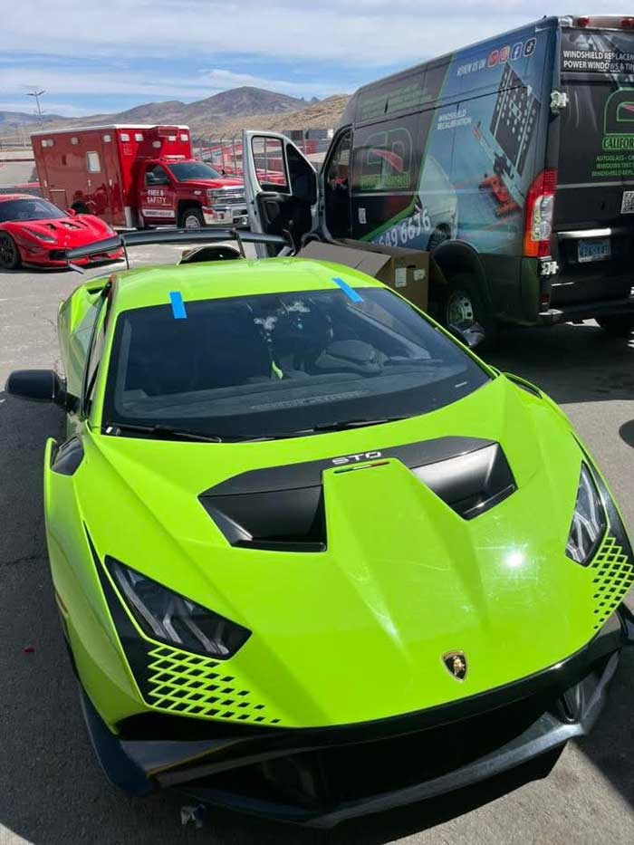 Completed green Lamborghini Huracán STO after windshield installation